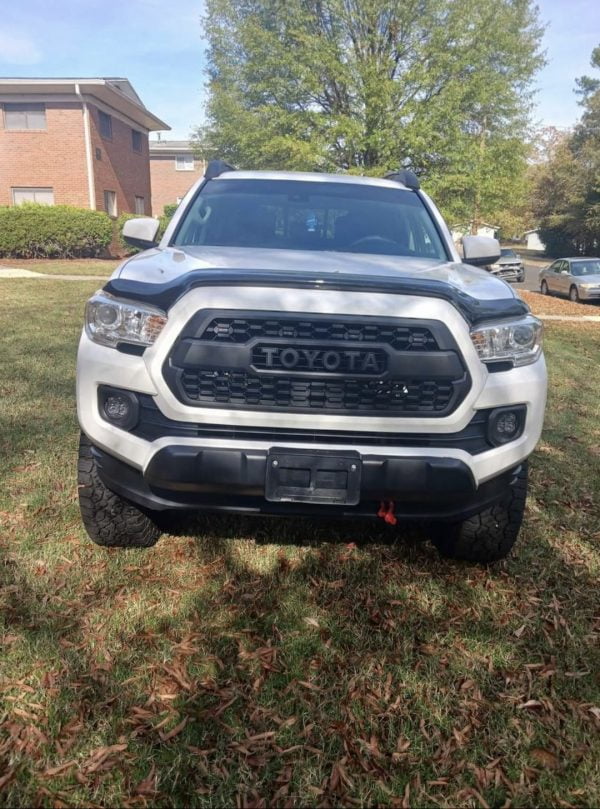 photo of customer white TRD offroad truck with trd pro stiyle grill