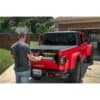 rugged-ridge-armis-folding-bed-cover-line-x-jt-13550.24-lifestyle-2 Rugged Ridge 13550.24 Armis Hard Folding Bed Cover with LINE-X for 20-22 Jeep Gladiator JT