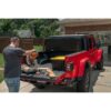 rugged-ridge-armis-folding-bed-cover-line-x-jt-13550.24-lifestyle-5 Rugged Ridge 13550.24 Armis Hard Folding Bed Cover with LINE-X for 20-22 Jeep Gladiator JT