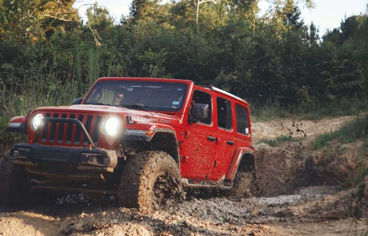 image of Red Jeep Wrangler Offroading