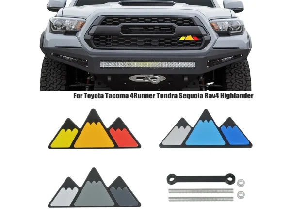 Mountain Grille badge with tacoma in back ground three tri color options shown