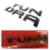 black tundra letters on a red truck Tundra Tailgate Letters | 2014-2021 3D Raised Inserts