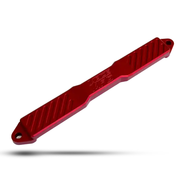 Red aluminum high clearance side step for off-road vehicles, durable and skid-resistant.